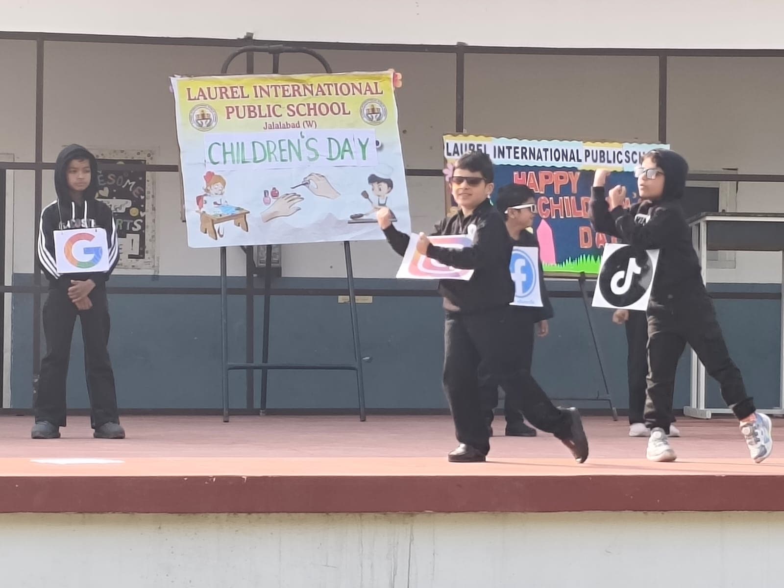 Students performing a Children's Day skit dressed as social media apps